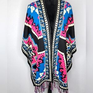 Flying Tomato Poncho Size M/L. #501